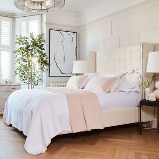 bright and airy bedroom with large bed