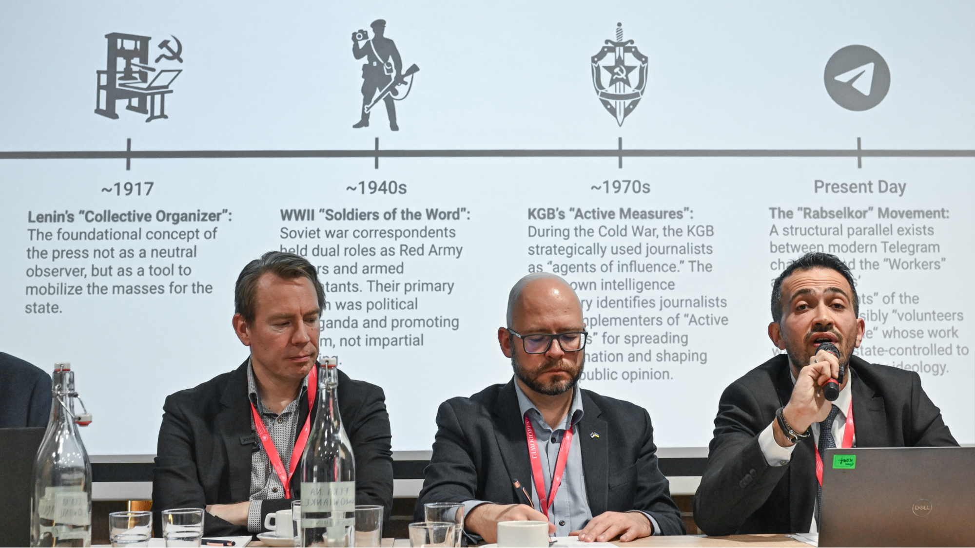 Scholars Gather In Krakow For 'Need To Know XIV' Intelligence ConferenceKRAKOW, POLAND NOVEMBER 27:Murat Doleker (R) from Ministry of National Education, Turkey, presents on 'War Correspondents as a Conduit Utilized by Russiain Its Information Activities' during Panel III (Soviet Russian Active Measures/Hybrid Warfare) of the 'Need to Know XIV: In a World of Mirrors. Intelligence and Disinformation' conference, organised by the Institute of National Remembrance (IPN) and the Need to Know research network, in Krakow, Poland, on November 27, 2025. The network, founded in 2011, brings together international scholars to examine intelligence, security services and disinformation from the Cold War to the present. (Photo by Artur Widak/NurPhoto via Getty Images)