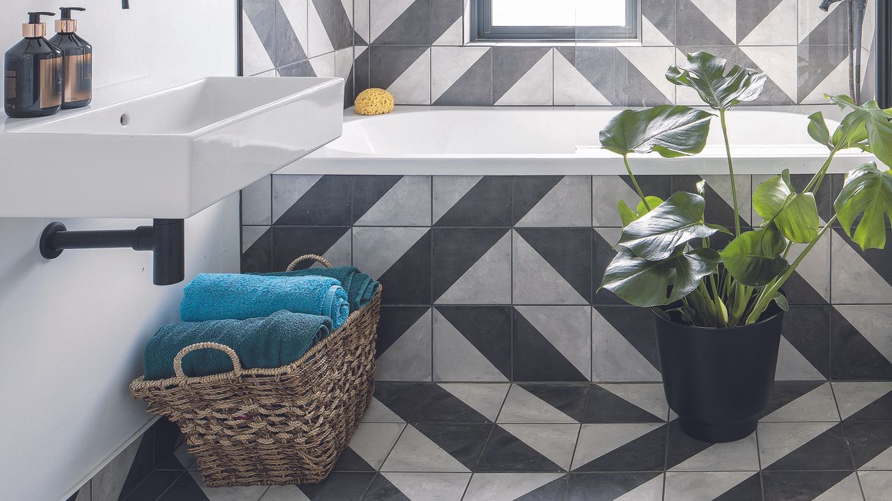 Grey and black abstract tiled bathroom