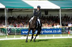 Ingrid Klimke riding FRH Butts Abraxxas during the dressage at The Land Rover Burghley Horse Trials