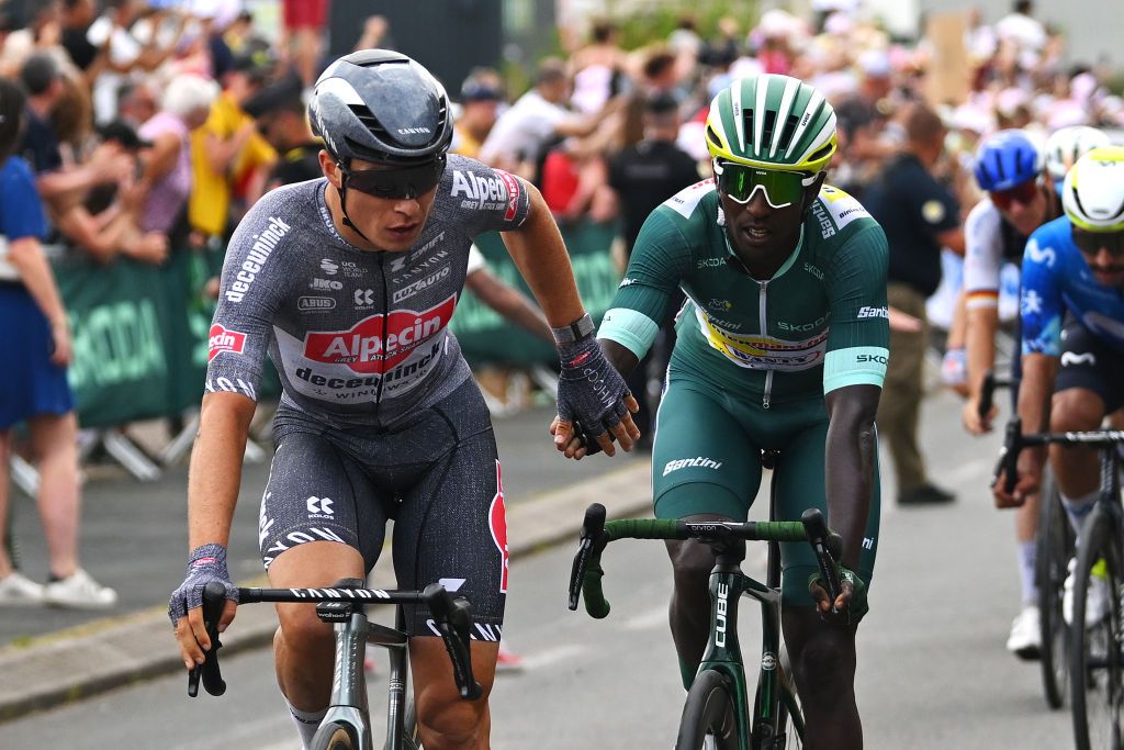 SAINTAMANDMONTROND FRANCE JULY 09 LR Stage winner Jasper Philipsen of Belgium and Team Alpecin Deceuninck and Biniam Girmay of Eritrea and Team Intermarche Wanty Green Sprint Jersey react after the 111th Tour de France 2024 Stage 10 a 1873km stage from Orleans to SaintAmandMontrond UCIWT on July 09 2024 in Orleans France Photo by Dario BelingheriGetty Images