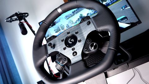 Logitech G Pro Racing Wheel and Pedals installed on a computer desk