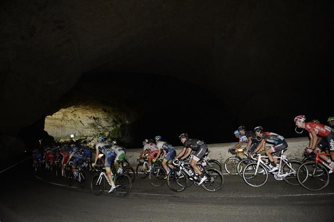The peloton in a tunnel under the Pyrenees