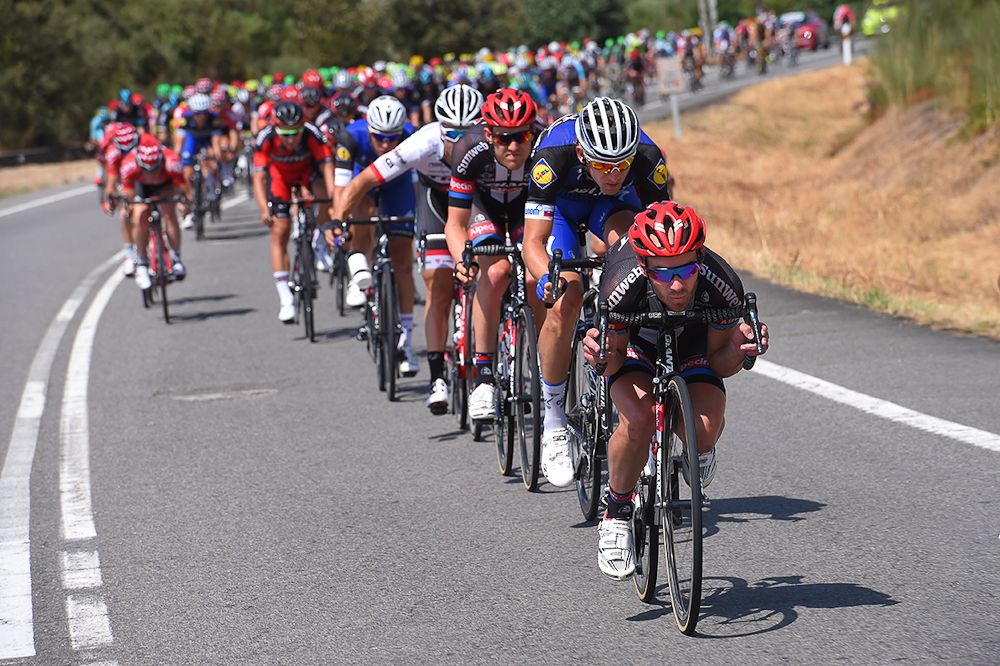 Johannes Frohlinger (Giant-Alpecin) leads the bunch during stage 7