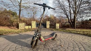 Segway Kickscooter ZT3 Pro parked on sidewalk