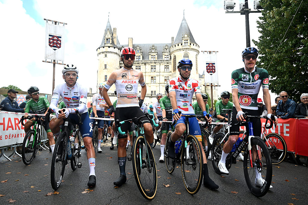 Samuel Leroux of France and Team TotalEnergies - White Leader Jersey, Nicolas Milesi of Italy and Team Arkea - B&amp;amp;B Hotels - Beige Best Young Rider Jersey, Mael Guegan of France and Team CIC - U - Nantes - Polka Dot Mountain Jersey and Dorian Godon of France and Team Decathlon AG2R La Mondiale - Green Points Jersey prior to the 39th Tour Poitou - Charentes en Nouvelle Aquitaine 2025, Stage 4 a 185.9km stage from La Rochefoucauld to Poitiers on August 29, 2025 in La Rochefoucauld, France. (Photo by Luc Claessen/Getty Images)