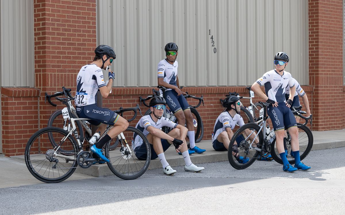 The Toronto Hustle team tries to stay out of the sun prior to the start of Stage 1.