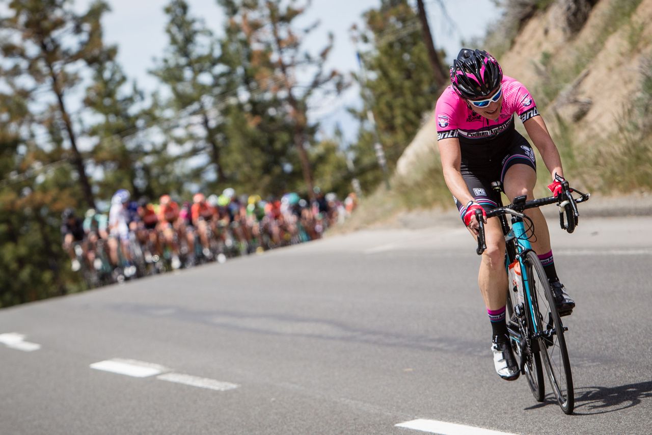 Sarah Storey (Podium Ambition) feels the field bearing down on her after being away all day