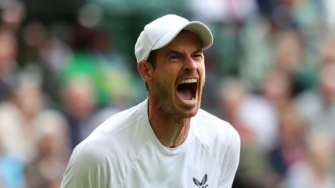 Andy Murray of Great Britain reacts in his match against James Duckworth of Australia during Men&#039;s Singles First Round match during Day One of The Championships Wimbledon 2022