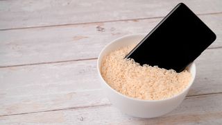 An image of a phone in rice