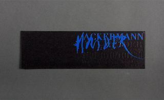 ﻿Ackermann’s invitation came emblazoned with a super-glossy, blue paint logo, with black debossed show details