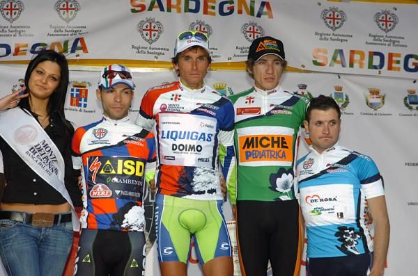 The jersey holders gather on the podium after stage four.