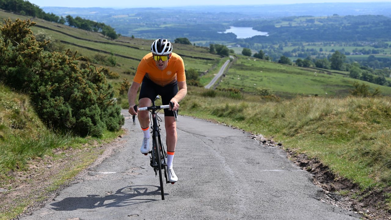 Male cyclist riding outside