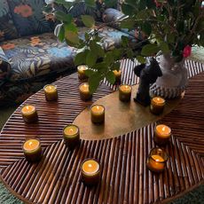 candles by JW Marriott x Flamingo Estate burning on a table