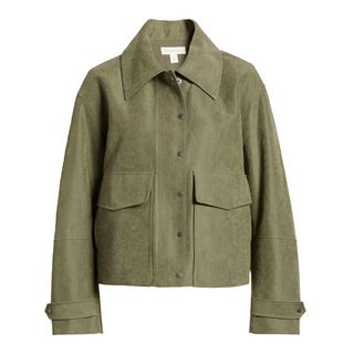 A cutout of a khaki cropped jacket on a white background