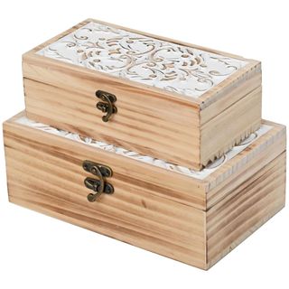 Two wooden storage boxes with brass latches stacked up