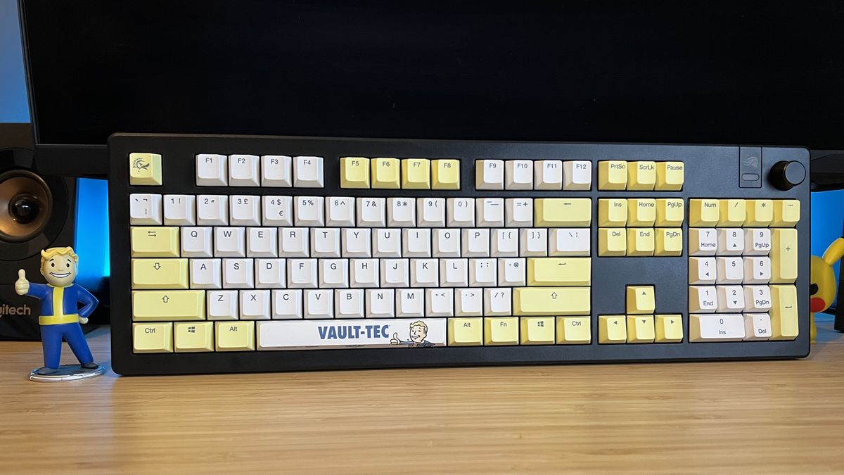 Ducky Fallout keycaps on a Glorious GMMK 3 keyboard on a wooden desk