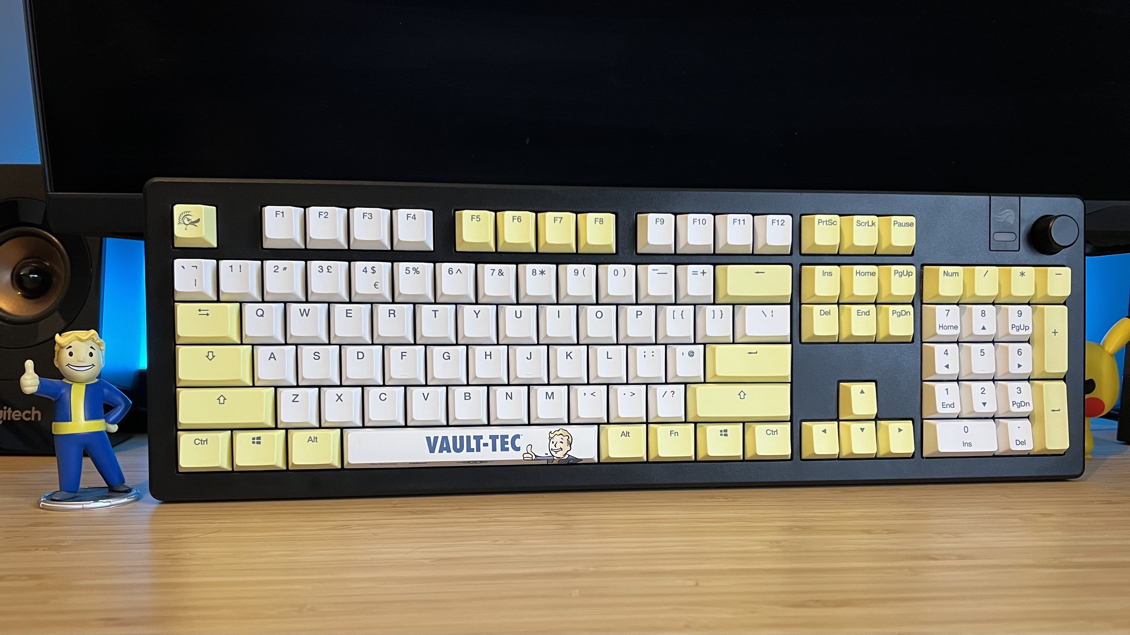 Ducky Fallout keycaps on a Glorious GMMK 3 keyboard on a wooden desk