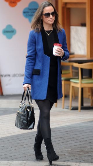 Pippa Middleton walks in London with a coffee on November 3, 2011