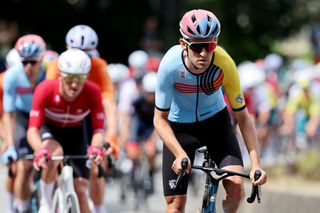 Tiesj Benoot leads the peloton for team Belgium at the 2024 Olympic road race