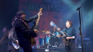 Steven Van Zandt and Paul McCartney onstage