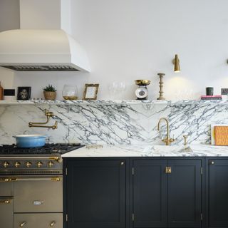 marble and dark painted shaker kitchen