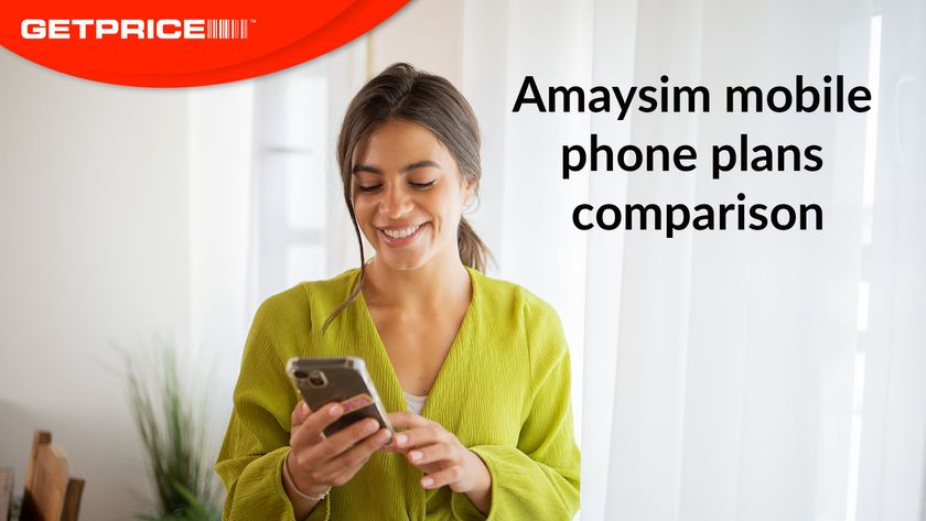Woman holding phone and smiling at it with red GetPrice logo on top left corner and black writing that says Amaysim mobile phone plans comparison
