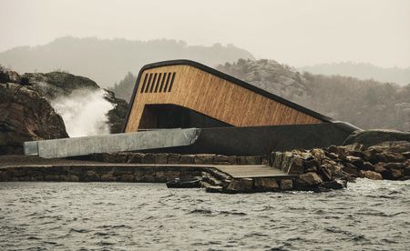 A building half sank into the ocean