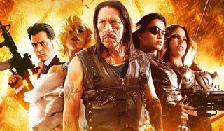 Machete Kills the cast stands in front of an explosion