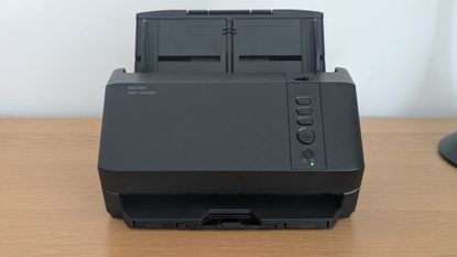 The Ricoh SP-2230N on a desk