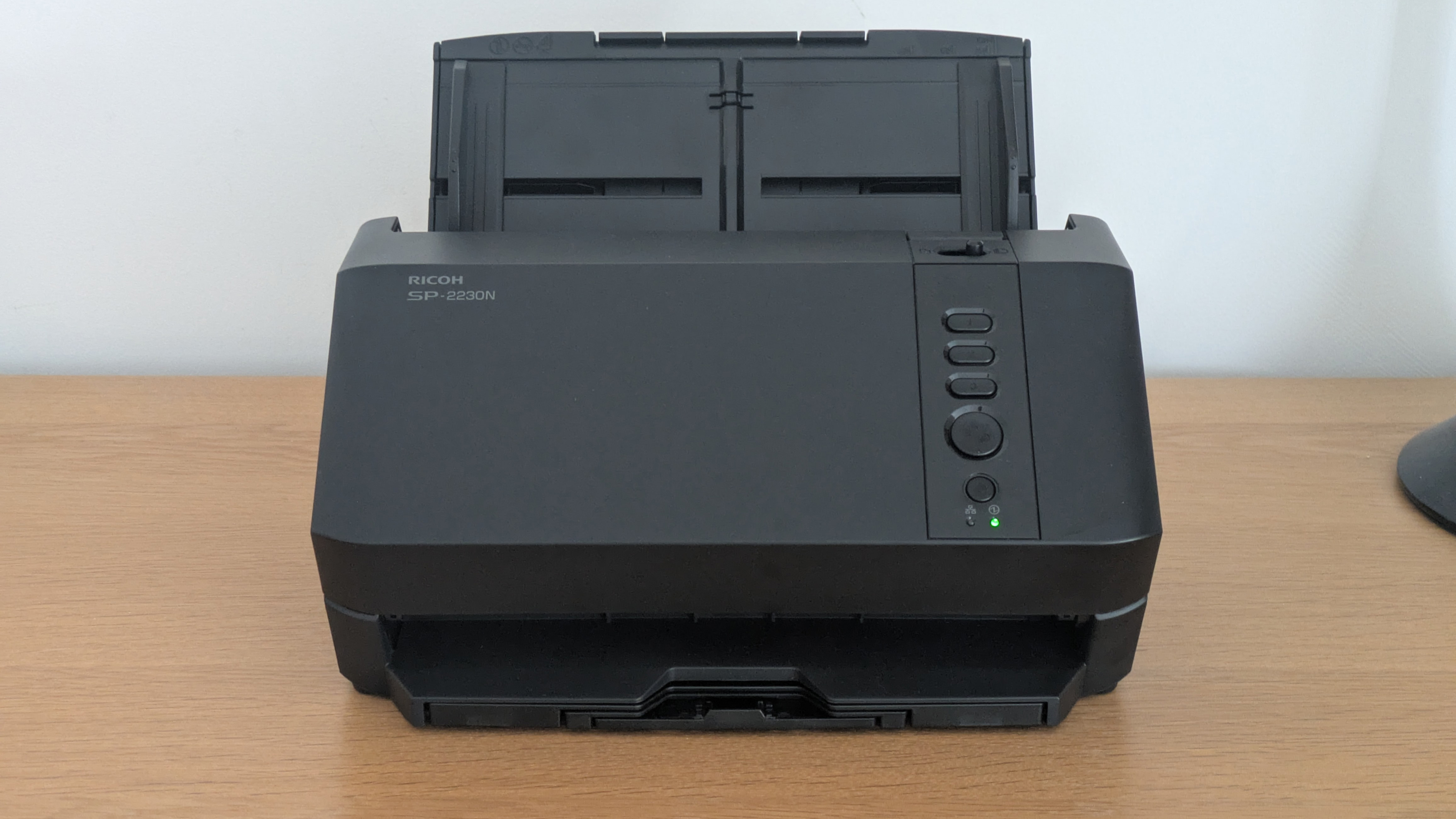 The Ricoh SP-2230N on a desk