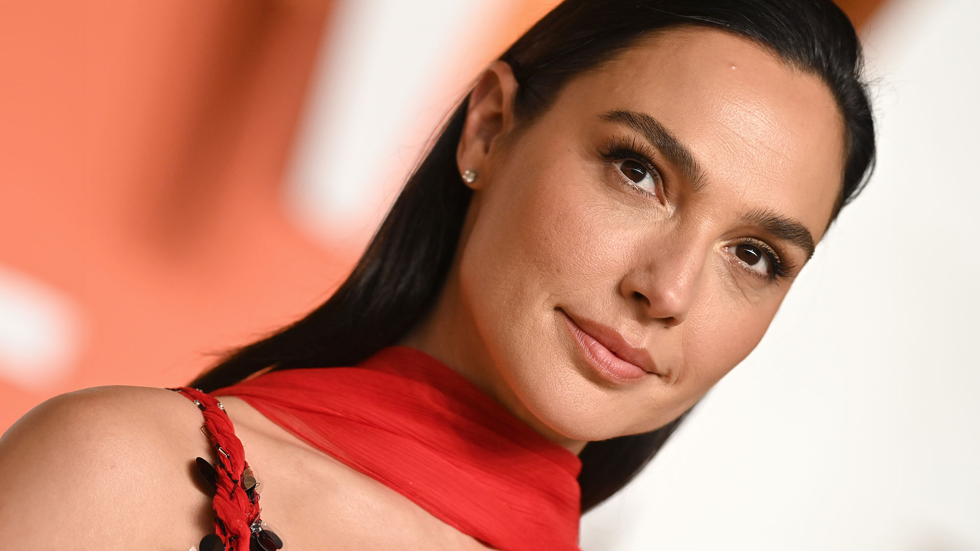 Gal Gadot wearing red at the Vanity Fair Oscar Party