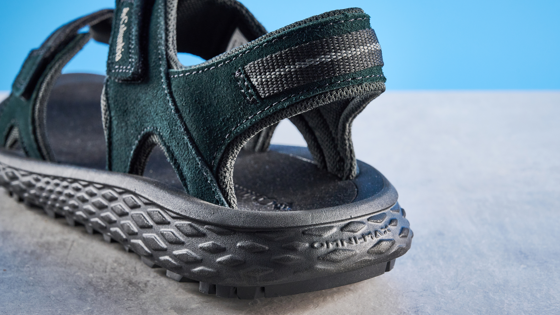 the columbia konos hiker 2-strap hiking sandals with the blue tom's guide background