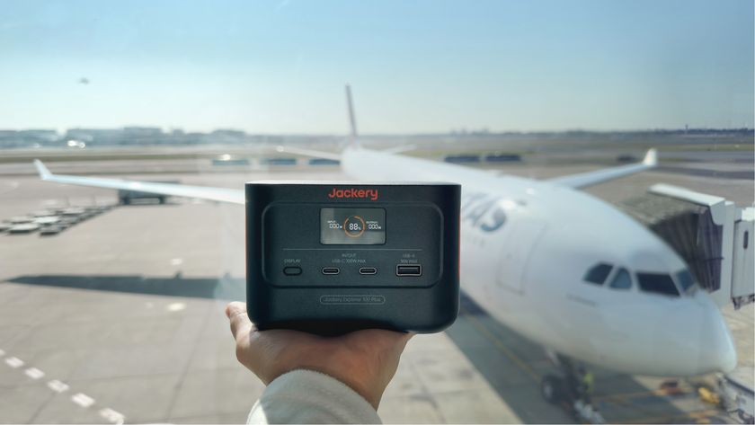 Jackery power bank in front of an aeroplane