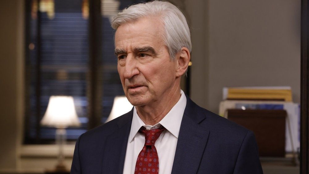 Sam Waterston as D.A. Jack McCoy sitting in his office in Law &amp; Order season 22