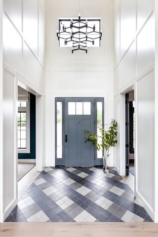 Hallway with checked tiled floor