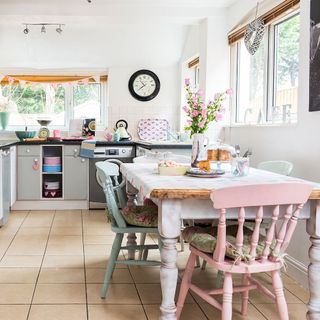 kitchen with candy colours painted chairs