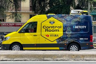 The Visma-Lease a Bike control room van parked on the side of the road ahead of the start of the Tour de France 2024
