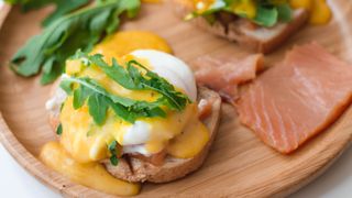 Eye health tips: An image of poached eggs benedict, a meal known for its eye health-boosting properties