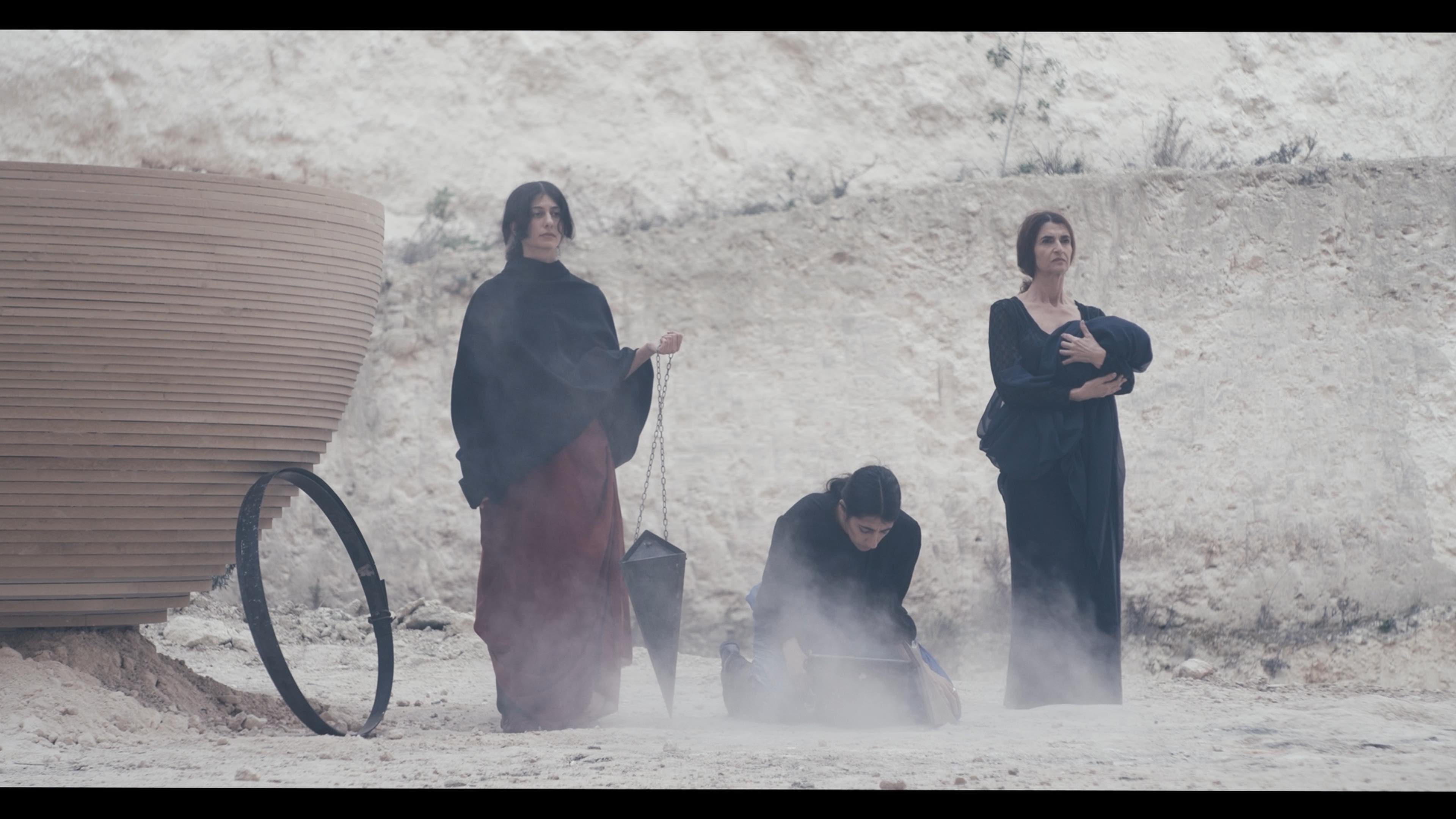 three women in duty stone quarry