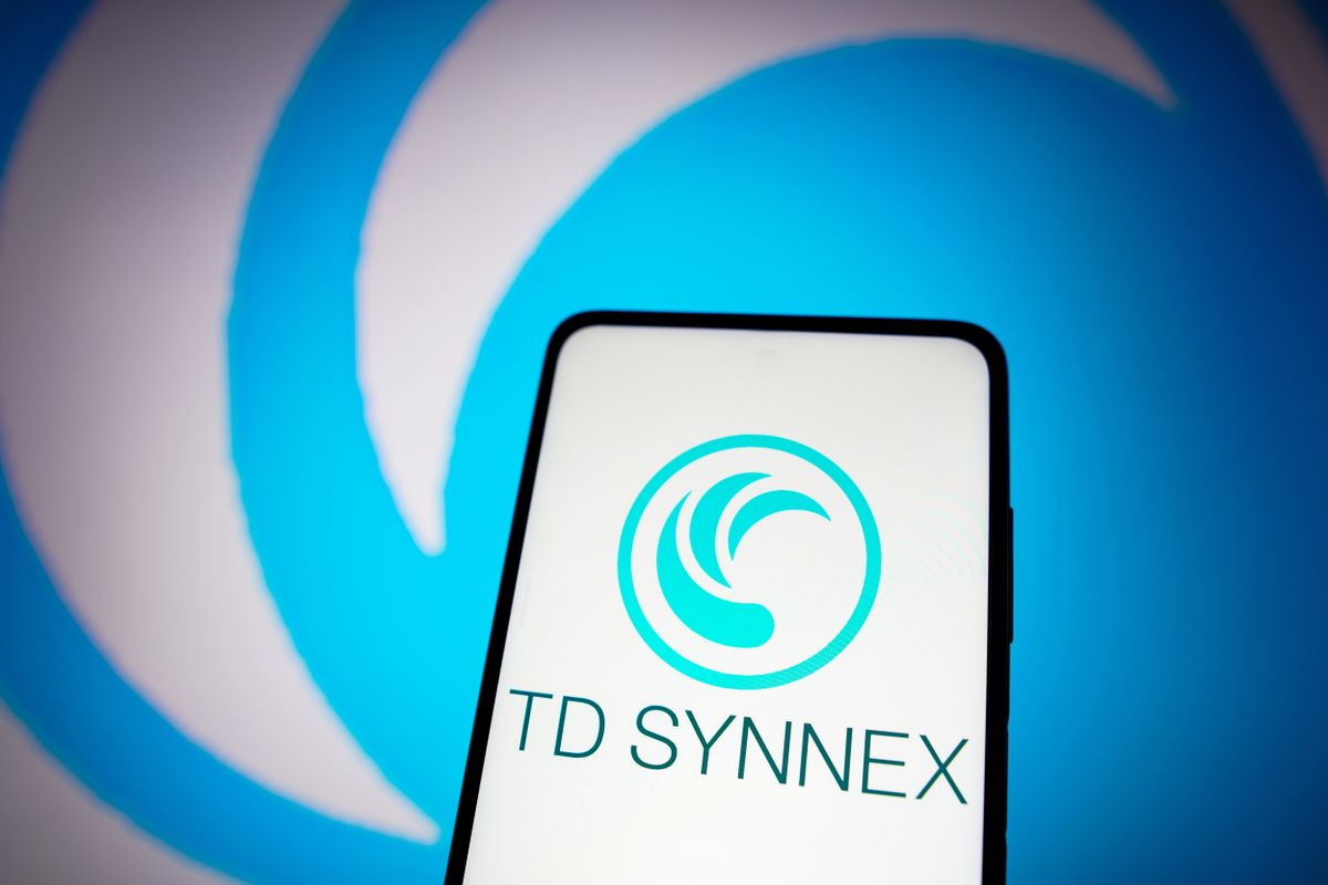 TD Synnex logo appearing on a smartphone against a backgrouns with even bigger version of the logo blown up, eclipsing the screen