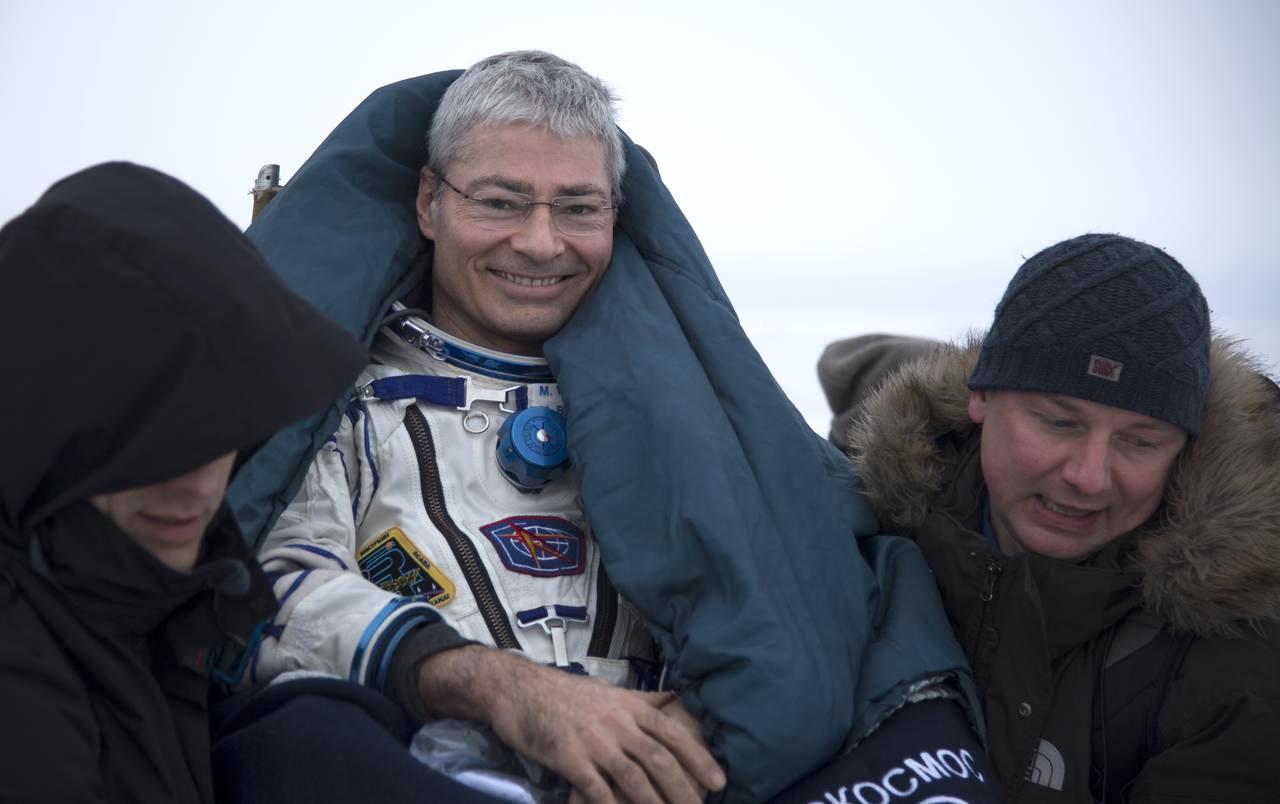 NASA astronaut Mark Vande Hei is carried to a medical tent shortly after he, NASA astronaut Joe Acaba, and Russian cosmonaut Alexander Misurkin landed in their Soyuz MS-06 spacecraft near the town of Zhezkazgan, Kazakhstan on Wednesday, Feb. 28, 2018