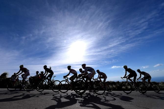 The sun shnes on the peloton.