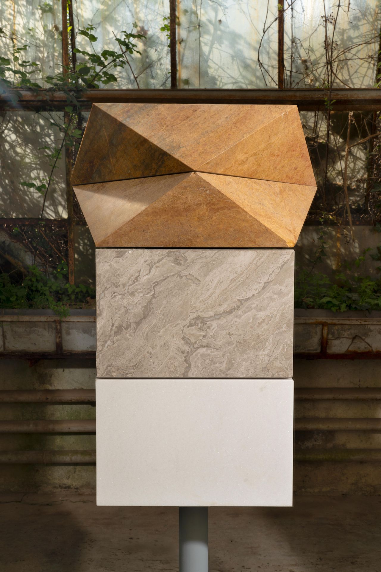 Sculptural Marble objects in abandoned glasshouse