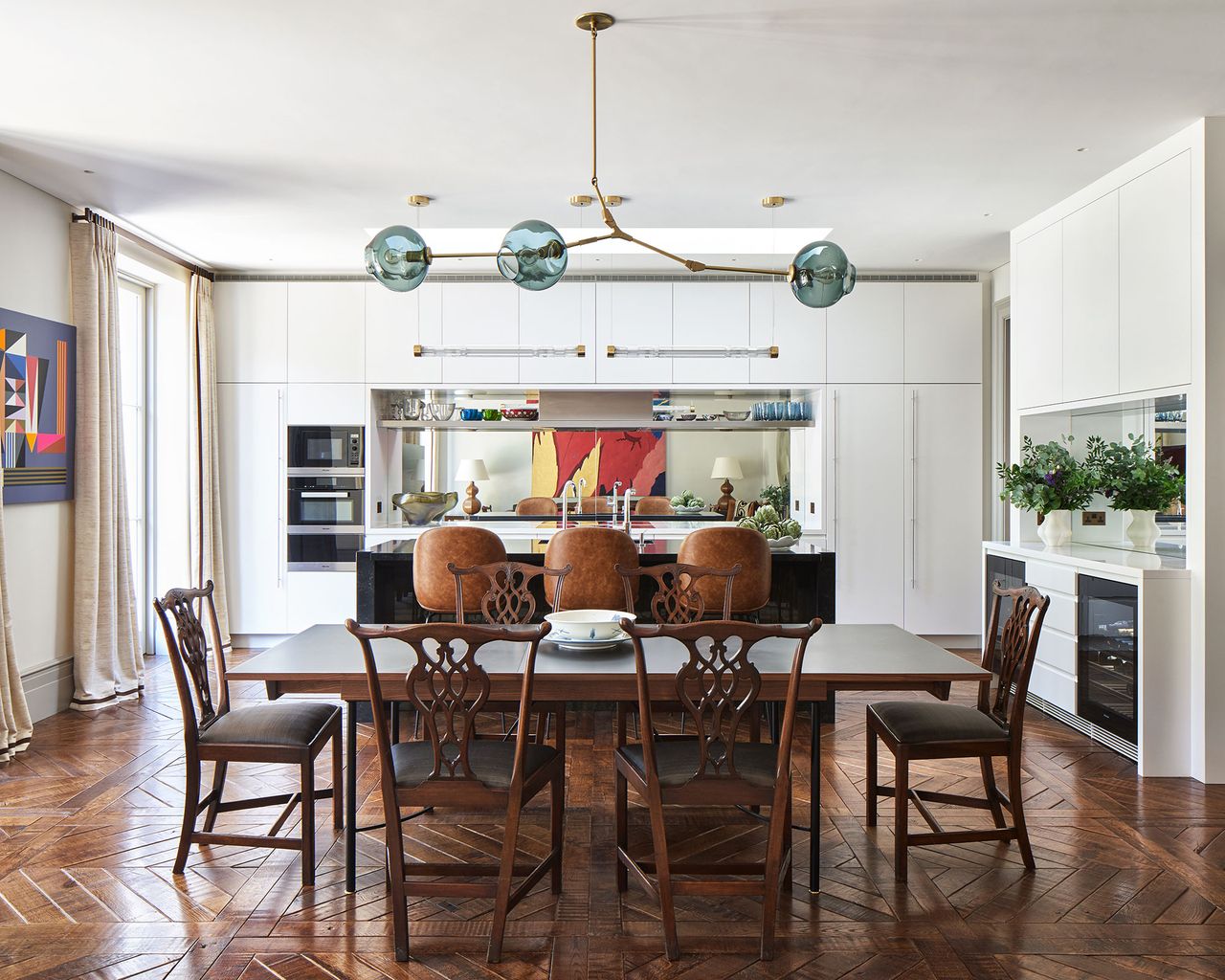 Kitchen diner with table, chairs and storage cabinets