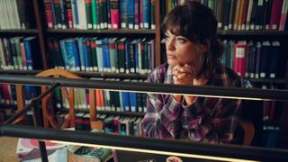 Maeve (Emma Mackey) in the college library in Sex Education season 4