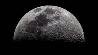 the moon seen against the blackness of space