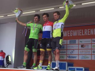 Dylan Groenewegen pulls on the Dutch national champion's jersey