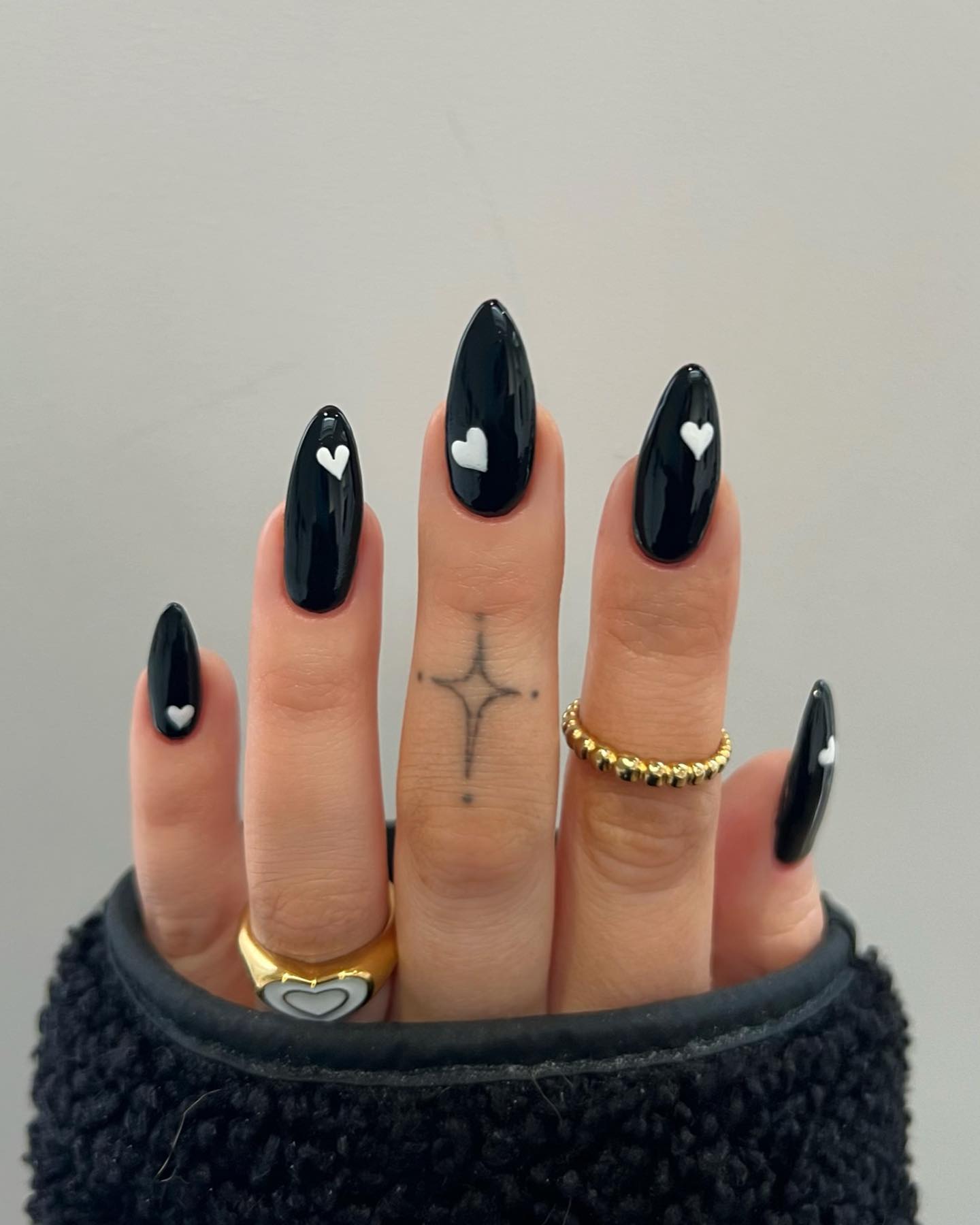Black nail polish manicure design.