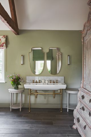 Light green bathroom with double sink